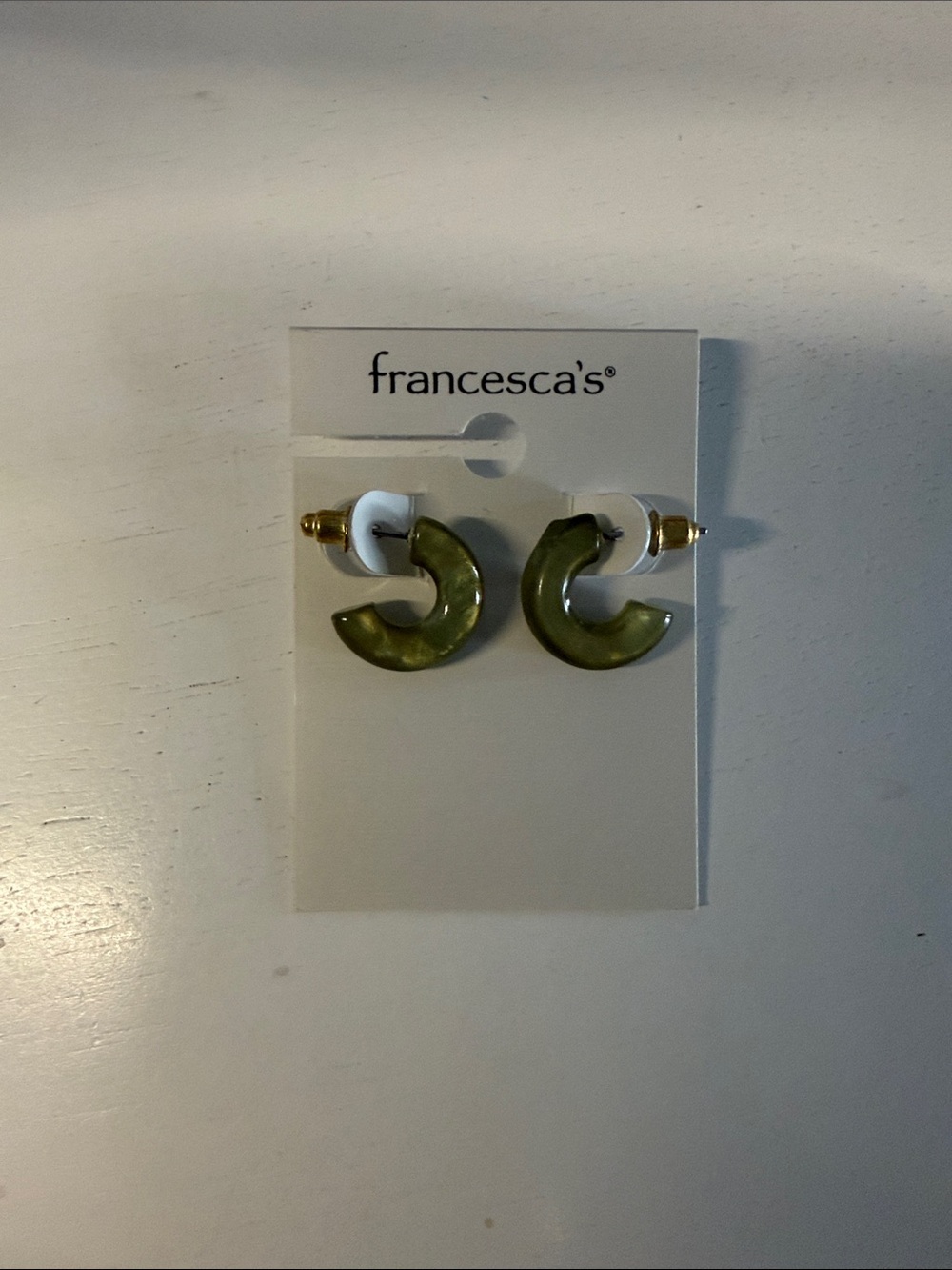 Francesca's Olive Resin C-Shape Hoop Earrings with Gold Posts